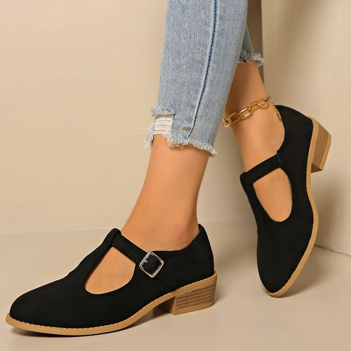 Classic Suede Block Heel Slip-Ons in black, featuring a stylish buckle and block heel for added comfort.