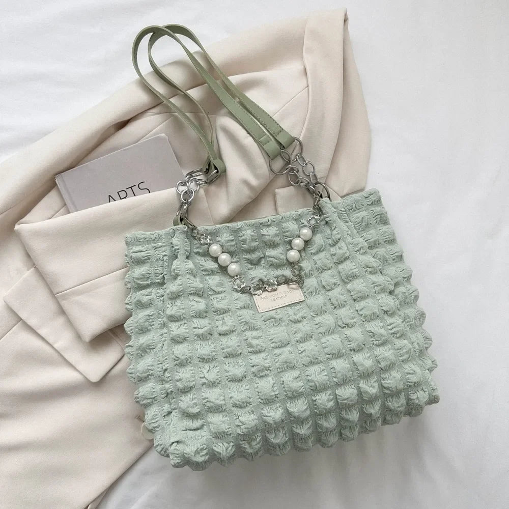 Confidence Carry Bubble Textured Tote Bag in mint green, featuring a unique bubble-textured design and stylish straps.