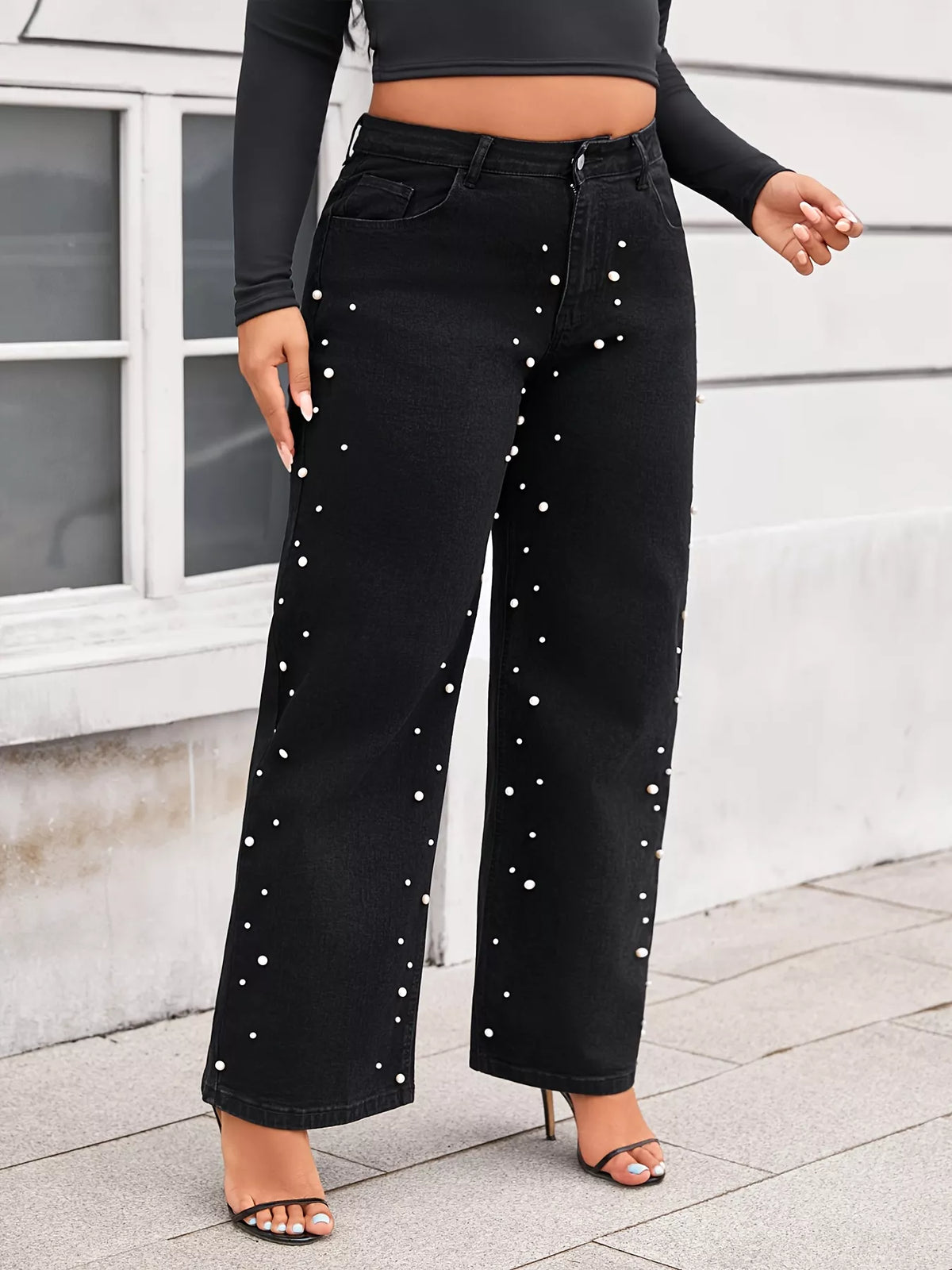 Plus Size Pearl Embellished Wide Leg Jeans featuring pearl embellishments for a stylish look.