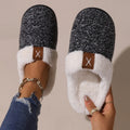 Cozy Fleece-Lined Slippers in black and white with soft fleece lining for ultimate comfort.