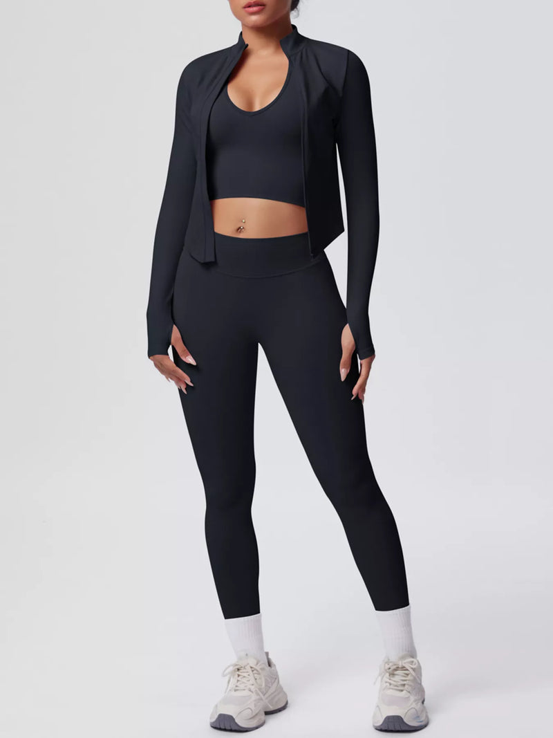 Stylish activewear set featuring a tank top, zip-up jacket, and leggings in black for fashionable workouts.