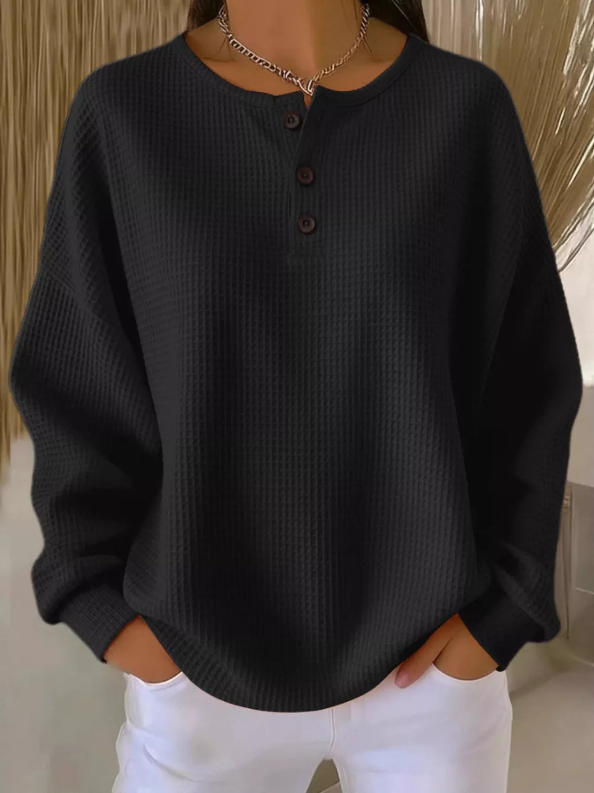 Full Size Waffle Knit Half Button T-Shirt Plus Size in black, featuring a relaxed fit and cozy texture.