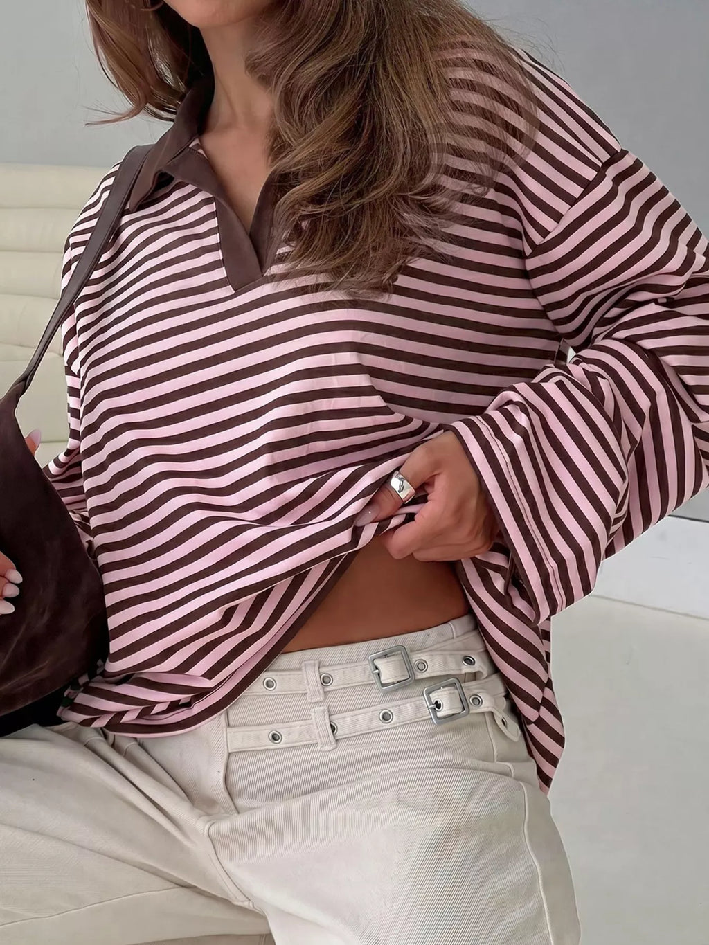 Vintage striped polo shirt long sleeve top displayed with casual style and comfort, featuring pink and brown stripes.