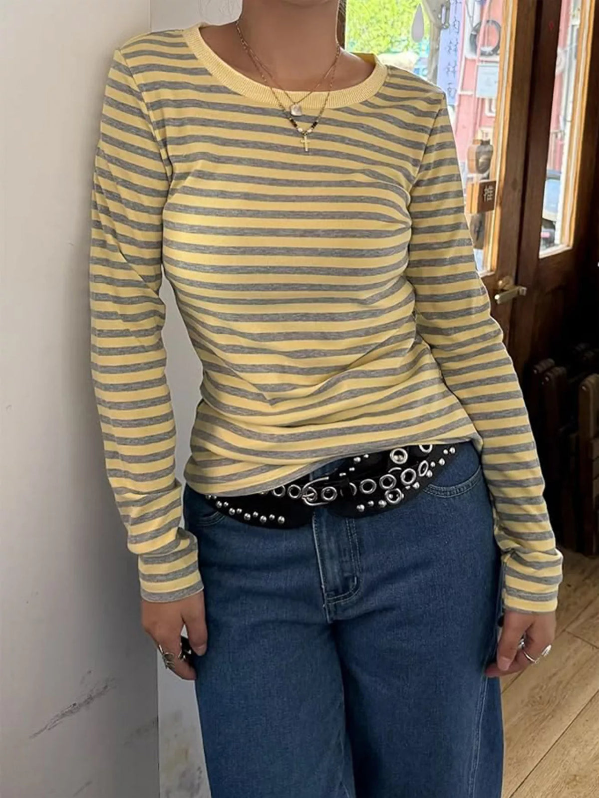 Slim-Fit Striped Long Sleeve T-Shirt in yellow and gray, styled with jeans and accessories.